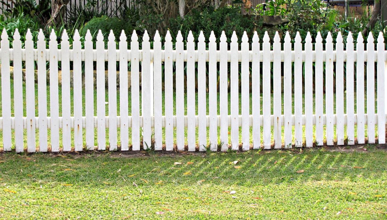Installing a white picket fence
