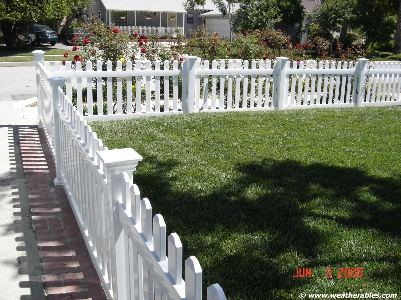 Installing a white picket fence
