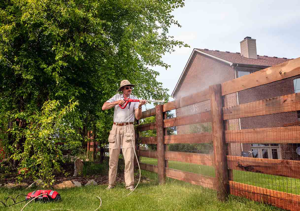 Cleaning solution for wood fence